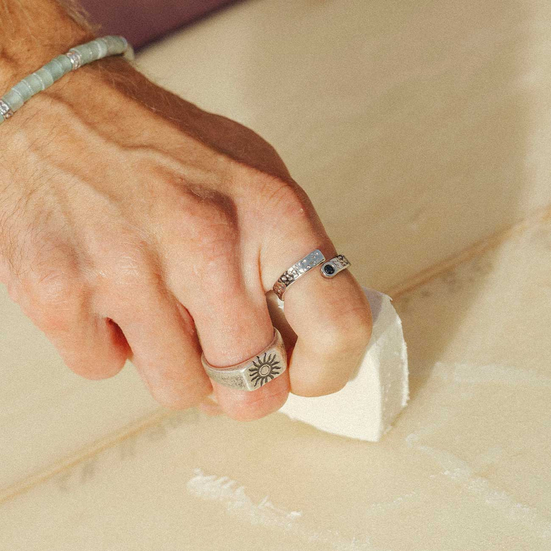 Channel Ring and Sun Signet Ring worn
